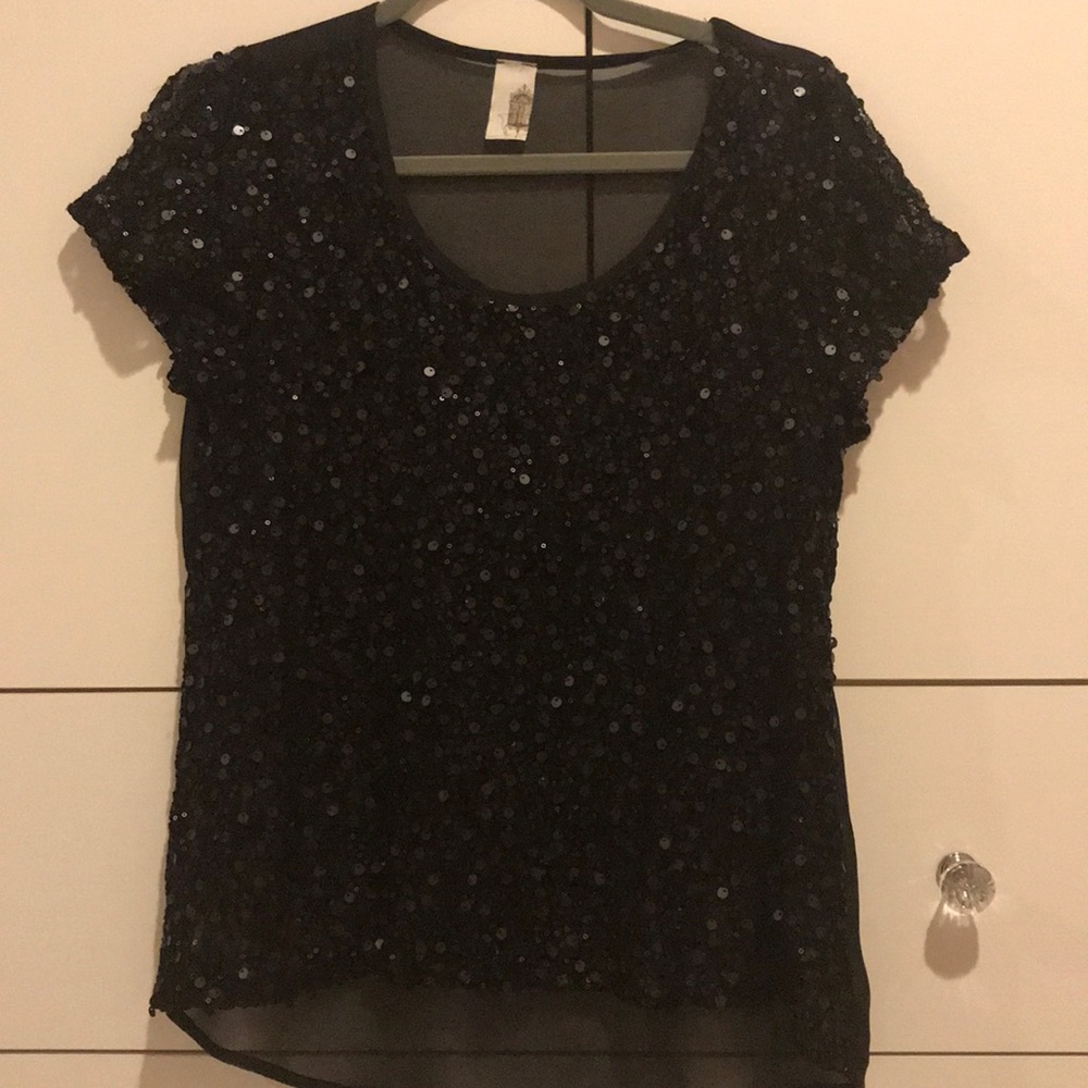 A sparkly see through top